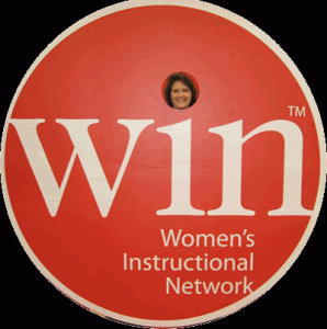 Robin Neal signs into WIN and gets the hot promo shot too!