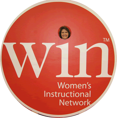 Robin Neal signs into WIN and gets the hot promo shot too!